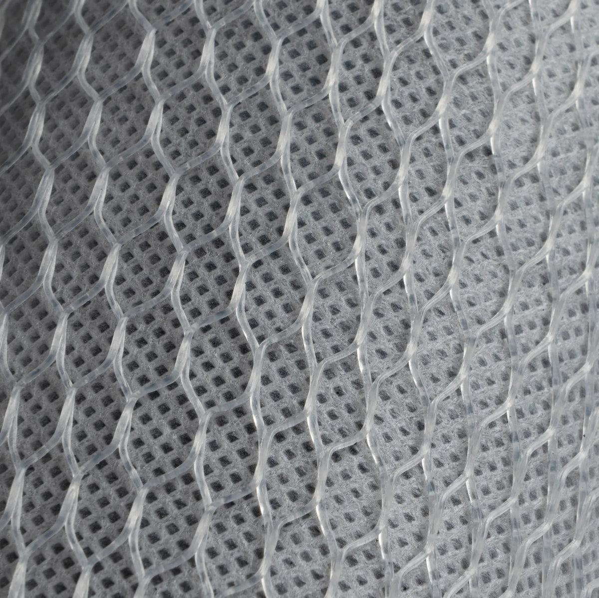 Close-up of the polypropylene netting on the carbon block cartridge